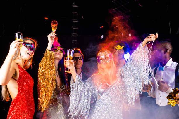 istock Friends in carnival masks celebrating 1421069164
