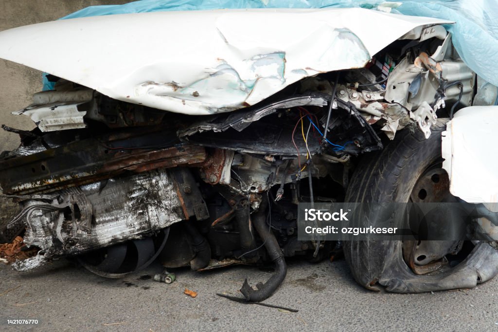 Crashed Car-damaged car from the traffic accident Abstract Stock Photo
