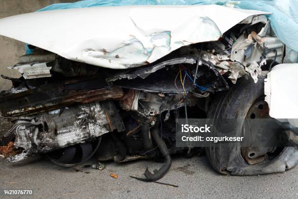 Crashed Cardamaged Car From The Traffic Accident Stock Photo - Download Image Now - Abstract, Accidents and Disasters, Auto Repair Shop
