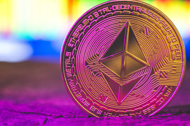 World cryptocurrency. Ethereum coin in purple neon light close-up. Financial system of the future - Ukraine, Izmail 17.03.22 World cryptocurrency. Ethereum coin in purple neon light close-up. Financial system of the future - Ukraine, Izmail 17.03.22 ethereum stock pictures, royalty-free photos & images