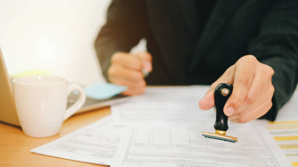 istock Businessman  approval, certified law  signing. 1421085356