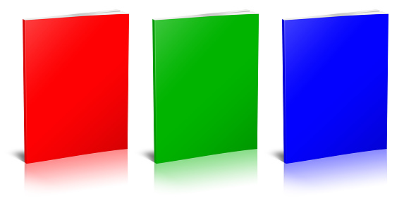 Three RGB Paperback books blank template red, green and blue for presentation layouts and design. 3D rendering. Digitally Generated Image. Isolated on white background.