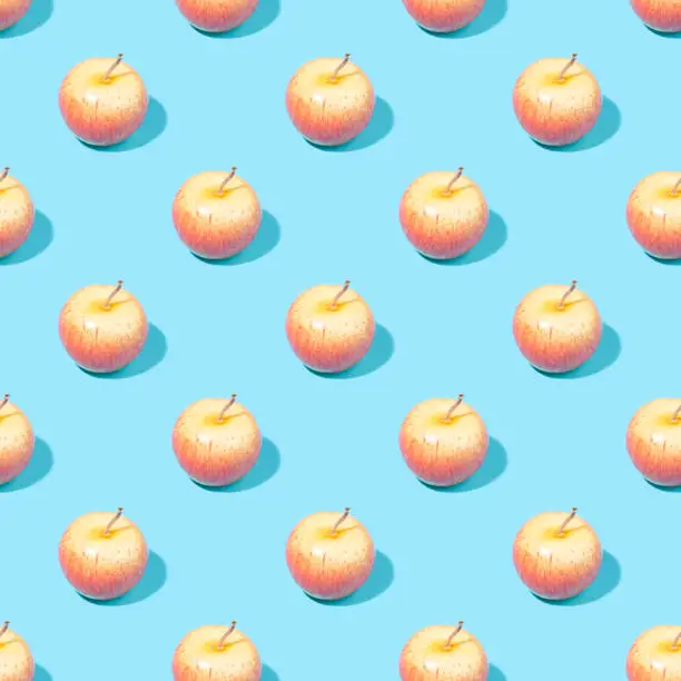 Seamless summer background with apples - absolutely seamless pattern of apples on a blue background
