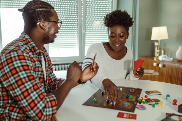 istock Game night at home and having fun with board games 1421092614