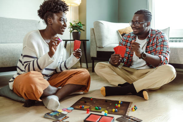 istock Young couple bonding together at home during the weekend 1421093455