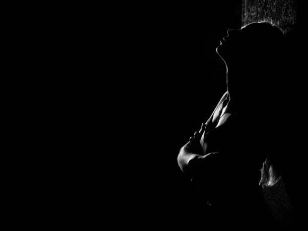 istock woman in dark 1421093890