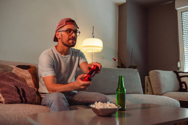 istock The young man focused on the game 1421102946