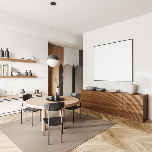 istock Light living room interior with table and seats, drawer and mockup frame 1421104187