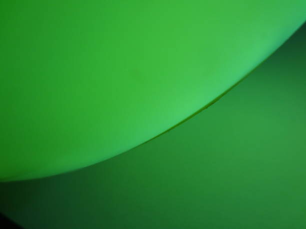istock Abstract Green Curve Texture  Defocused Textured Blurred Simple Glowing Template Motion Background 1421104518