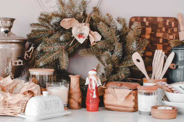 istock Christmas decor on a white table in a bright room, selective focus 1421107984