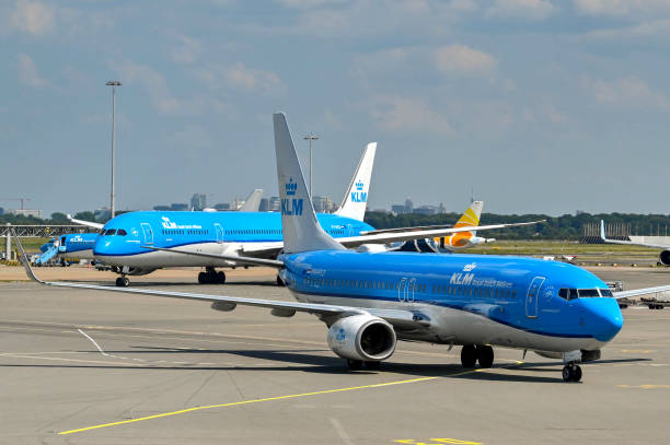 KLM Royal Dutch Airlines Boeing 737 arriving at Amsterdam Schipol airport Amsterdam, Netherlands - August 2022: KLM Royal Dutch Airlines Boeing 737 approaching the airport terminal after landing at Schipol airport klm stock pictures, royalty-free photos & images