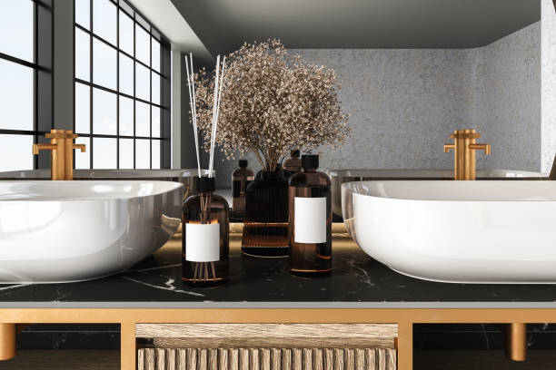 istock Close up of double sink with oval mirror hanging on black marble wall 1421113986