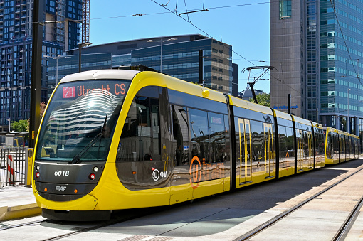 Utrecht, Netherlands - August 2022: Modern electric tram about to depart from one of the stops in the city centre