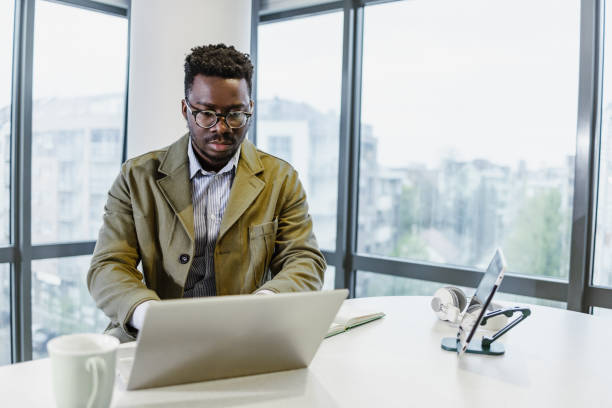 istock Businessman working at a desk in the office 1421116812