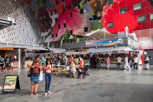 Rotterdam, Netherlands, September 5, 2022; modern market hall with many eateries and shops in the center of Rotterdam.