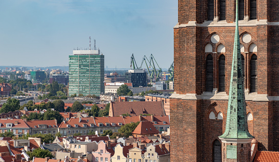 A picture of the Zieleniak Building as seen on the left of the St. Mary's Church's tower.