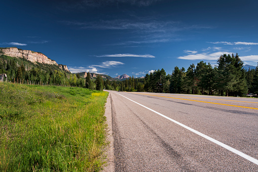 Highway 550 north of Durango, Colorado in the summer.  Image can be used to represent almost any country road in the Rocky Mountains.  It can also represent a road to adventure or tourism.