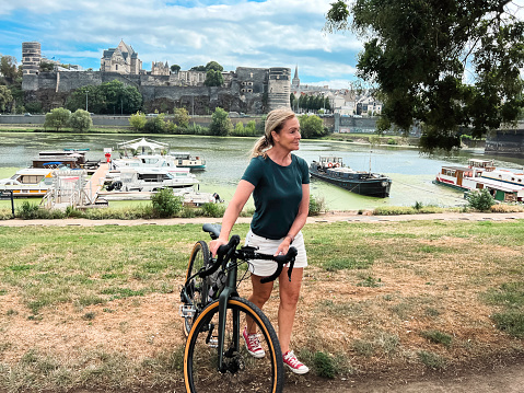 female cyclist in Angers, Loire Valley