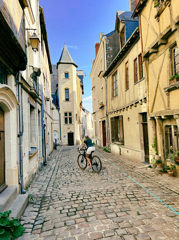 female cyclist in Angers, Loire Valley