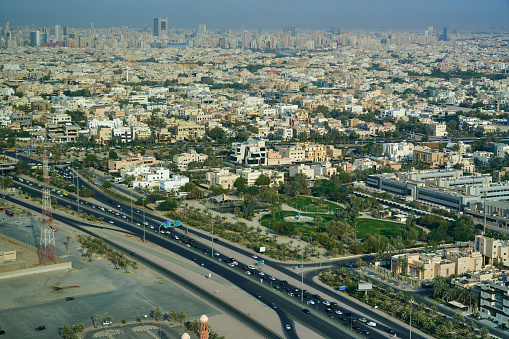 Aerial, daytime view of Shamiya, Keifan, Faiha, Abdulla Al Salem, Khaldiya and Adaliya residential districts in Kuwait City downtown. Kuwait.