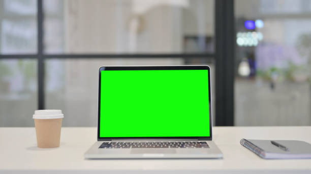 istock Laptop with Green Screen in Office 1421129175