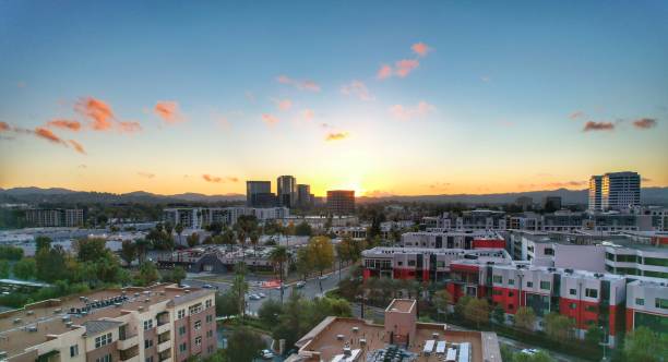 Aerial shot of Woodland Hills and Warner Center during the sunset. Apartments and the intersection of De Soto Avenue and Erwin street with Warner Center in the distance. Woodland Hills, California. woodland hills los angeles stock pictures, royalty-free photos & images