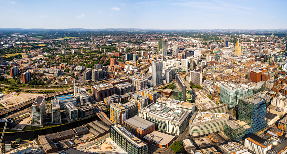 Manchester United Kingdom aerial shot of modern buildings with lots of counstruction in the central area of the city