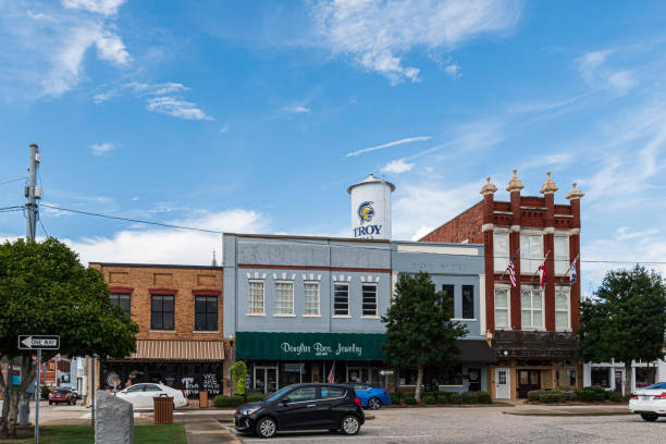 Troy, Alabama, USA - Sept. 3, 2022: View of small businesses surrounding the town square in historic downtown Troy, Alabama.