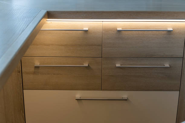 kitchen wooden drawers with metal handles, an element of cabinet furniture