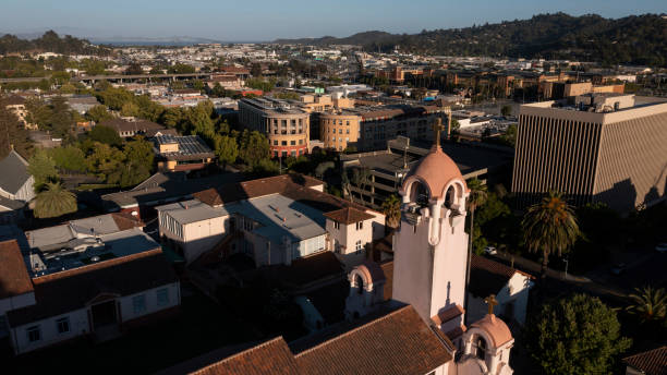 San Rafael, California Sunset light shines on the historic Spanish Colonial mission and downtown skyline of San Rafael, California, USA. san rafael california stock pictures, royalty-free photos & images