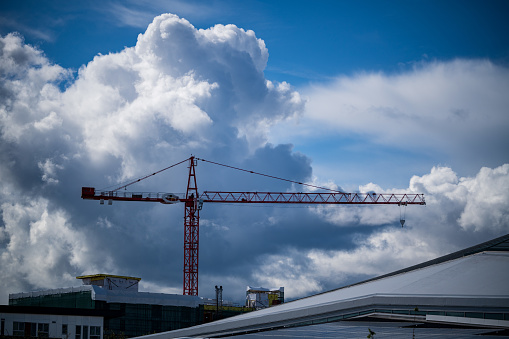 Enormous white clouds behind a Skycrane.