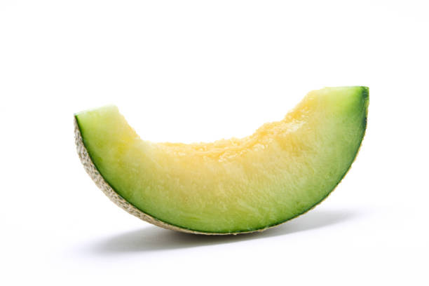 istock A thinly cut earl's melon photographed against a white background 1421152820