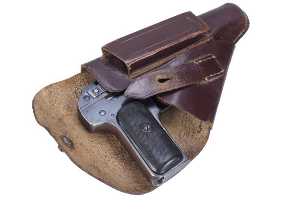 istock Vintage rusty handgun and holster 1421153097