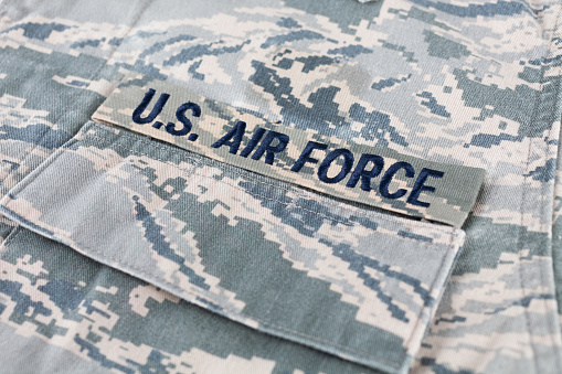 US AIR FORCE branch tape on digital tiger-stripe pattern Airman Battle Uniform (ABU) background