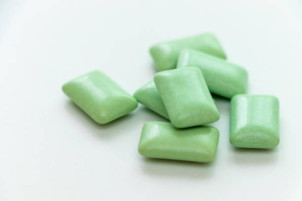 istock Green granular gum on the white table 1421168632