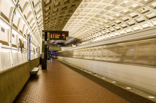Washington DC subway station with train leaving