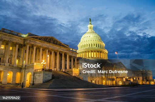 istock Front facade of Washington DC Capitol at night 1421170422