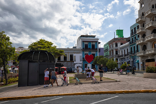 Tourists around I Love San Juan sign in Plaza Colon, Old San Juan, Puerto Rico