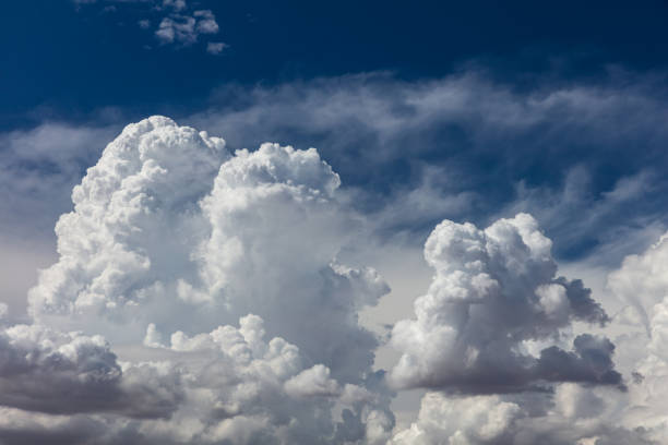 istock Closeup, cumulus clouds. Blue sky in background. 1421171759