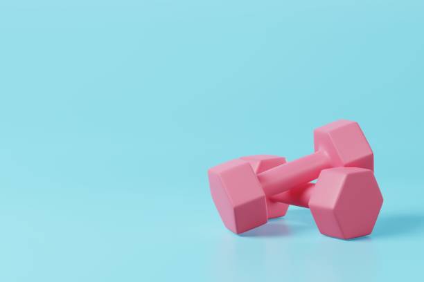 istock Minimal pink dumbbell on blue background. Weight training activity, bodybuilding exercise, daily gym and fitness, dieting for health, sport heavy for muscular building equipment concept. 3d rendering 1421175302