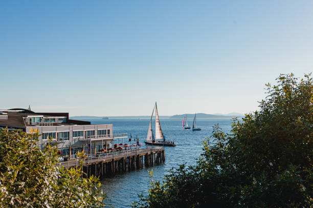 Sailboats on the water in Elliot Bay in Seattle Washington.