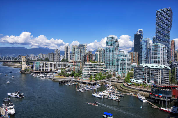 False Creek in summer, Vancouver, Canada False Creek in summer in Vancouver, Canada false creek stock pictures, royalty-free photos & images