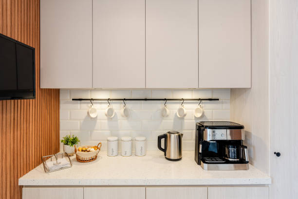 istock Refurbished kitchen with coffee machine and food storage bins 1421177502