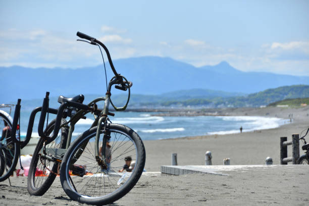 istock A beach cruiser type bicycle parked on the beach. 1421178674