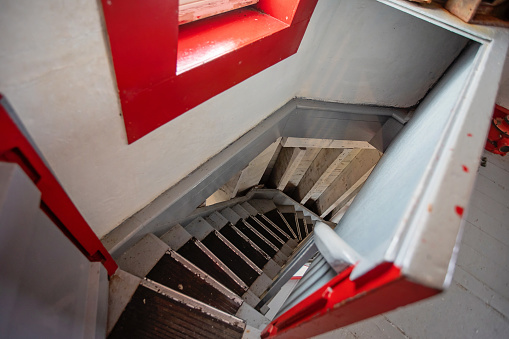 Looking down an interior spiral staircase