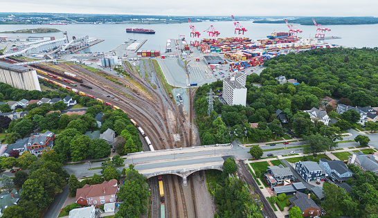 Rail lines lead toward a container dock.