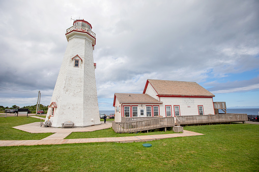 East Point, Canada - August 25, 2022. East Point Lighthouse was built in 1867 is still operating today. As well, visitors can climb to the top of the tower to get a view of the surrounding area and putchase from the gift shop.
