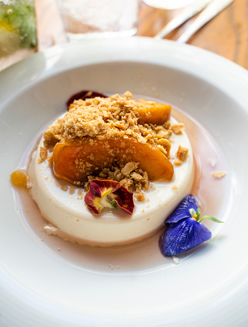 Panna Cotta Dessert with fruits and almond crumble
