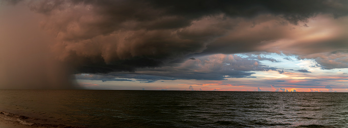 Naples beach panorama, a storm is coming in