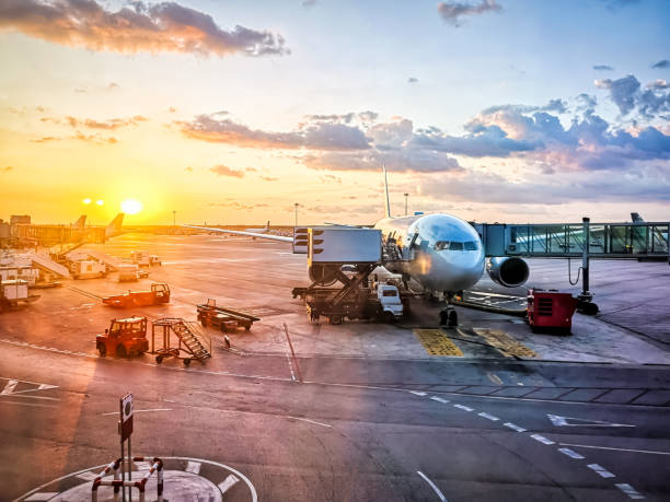 istock A white airplane during boarding in the morning 1421193265